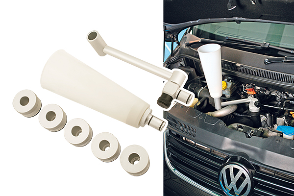 Oil filler kit prevents spillage onto engine and manifolds